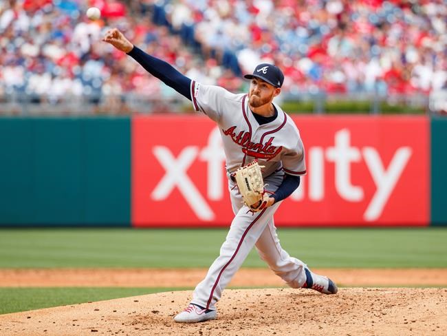 Atlanta Braves starting pitcher Kevin Gausman throws during the third inning of a baseball game against the Philadelphia Phillies, Sunday, July 28, 2019, in Philadelphia. (AP Photo/Chris Szagola)