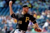 Pittsburgh Pirates starting pitcher Nick Kingham delivers during the first inning of a baseball game against the Texas Rangers in Pittsburgh, Wednesday, May 8, 2019. (AP Photo/Gene J. Puskar)