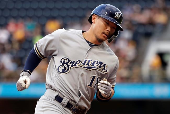 Milwaukee Brewers' Keston Hiura rounds third after hitting a two-run home run off Pittsburgh Pirates starting pitcher Trevor Williams during the first inning of a baseball game in Pittsburgh, Wednesday, Aug. 7, 2019. (AP Photo/Gene J. Puskar)