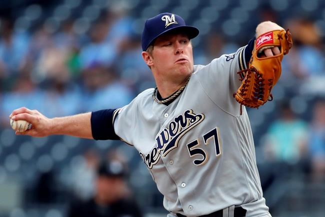 Milwaukee Brewers starting pitcher Chase Anderson delivers during the first inning of the team's baseball game against the Pittsburgh Pirates in Pittsburgh, Thursday, May 30, 2019. (AP Photo/Gene J. Puskar)