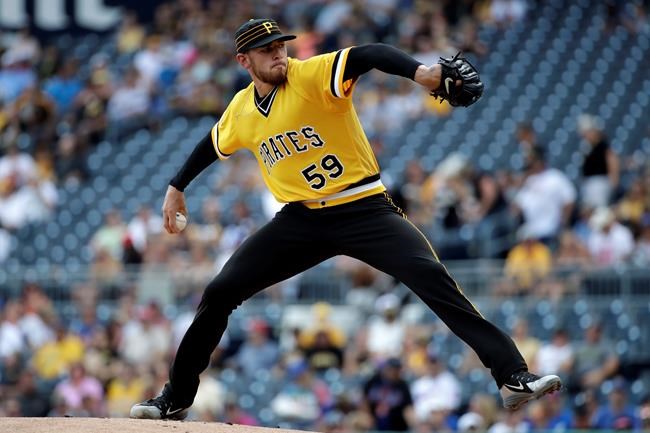 Pittsburgh Pirates starting pitcher Joe Musgrove delivers during the first inning of a baseball game against the New York Mets in Pittsburgh, Sunday, Aug. 4, 2019. (AP Photo/Gene J. Puskar)