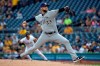 Milwaukee Brewers starting pitcher Jordan Lyles delivers during the first inning of a baseball game against the Pittsburgh Pirates in Pittsburgh, Monday, Aug. 5, 2019. (AP Photo/Gene J. Puskar)