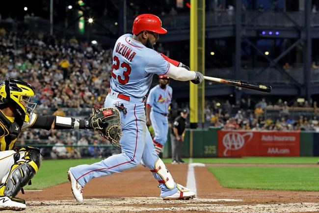 St. Louis Cardinals' Marcell Ozuna follows through on a three-run home run off Pittsburgh Pirates starting pitcher Steven Brault during the third inning of a baseball game in Pittsburgh, Saturday, Sept. 7, 2019. (AP Photo/Gene J. Puskar)