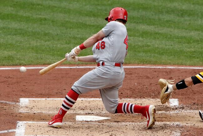 St. Louis Cardinals' Harrison Bader drives in a run with a single off Pittsburgh Pirates starting pitcher James Marvel during the fifth inning of a baseball game in Pittsburgh, Sunday, Sept. 8, 2019. (AP Photo/Gene J. Puskar)