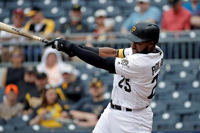 Pittsburgh Pirates' Gregory Polanco follows through for a two-run home run off Colorado Rockies starting pitcher Antonio Senzatela in the first inning of a baseball game in Pittsburgh, Thursday, May 23, 2019. (AP Photo/Gene J. Puskar)