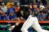 Pittsburgh Pirates' Erik Gonzalez drives in two runs with a single off Chicago Cubs starting pitcher Kyle Hendricks during the seventh inning of a baseball game in Pittsburgh, Tuesday, Sept. 24, 2019. (AP Photo/Gene J. Puskar)