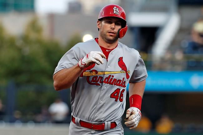 St. Louis Cardinals' Paul Goldschmidt rounds third after hitting two-run home run off Pittsburgh Pirates starting pitcher Jordan Lyles, left, during the second inning of a baseball game in Pittsburgh, Wednesday, July 24, 2019. (AP Photo/Gene J. Puskar)