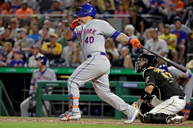 New York Mets' Wilson Ramos follows through on a two-run home run off Pittsburgh Pirates relief pitcher Kyle Crick during the eighth inning of a baseball game in Pittsburgh, Saturday, Aug. 3, 2019. (AP Photo/Gene J. Puskar)
