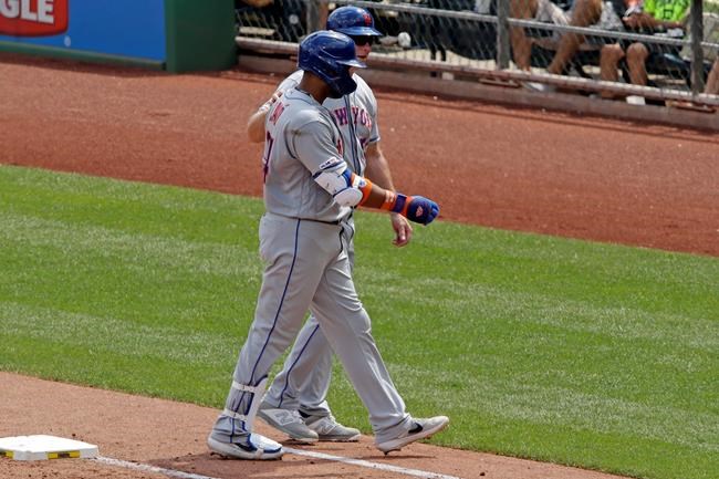 New York Mets' Robinson Cano, front, is helped off the field by first base coach Glenn Sherlock, back, during the fourth inning of a baseball game against the Pittsburgh Pirates in Pittsburgh, Sunday, Aug. 4, 2019. (AP Photo/Gene J. Puskar)