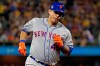 New York Mets' Wilson Ramos rounds third after hitting a two-run home run off Pittsburgh Pirates relief pitcher Kyle Crick during the eighth inning of a baseball game in Pittsburgh, Saturday, Aug. 3, 2019. (AP Photo/Gene J. Puskar)