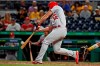 St. Louis Cardinals' Paul DeJong hits a solo home run off Pittsburgh Pirates relief pitcher Jose Osuna during the eighth inning of a baseball game in Pittsburgh, Wednesday, July 24, 2019. It was DeJong's third home run of the game. (AP Photo/Gene J. Puskar)