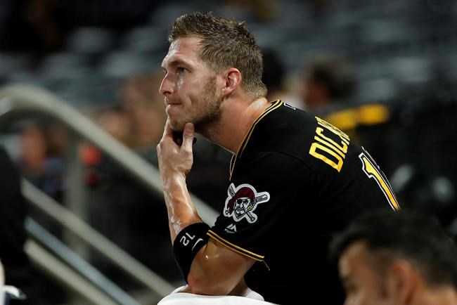 Pittsburgh Pirates' Corey Dickerson sits in the dugout during the bottom of the ninth inning of a baseball game against the St. Louis Cardinals in Pittsburgh, Wednesday, July 24, 2019. The Cardinals won 14-8. (AP Photo/Gene J. Puskar)