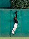 Pittsburgh Pirates center fielder Starling Marte leaps at the wall, but can't catch a three-run home run by Washington Nationals' Asdrubal Cabrera during the third inning of a baseball game Wednesday, Aug. 21, 2019, in Pittsburgh. (AP Photo/Keith Srakocic)
