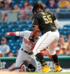 Pittsburgh Pirates first baseman Josh Bell (55) tags out Washington Nationals' Adam Eaton on a pickoff in the third inning of a baseball game, Tuesday, Aug. 20, 2019, in Pittsburgh. (AP Photo/Keith Srakocic)