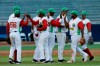 Players of Cuba's Los Leneros de las Tunas celebrate at the end of the ninth inning after defeating Venezuela's Cardenales de Lara on their Caribbean Series baseball tournament game at Rod Carew stadium in Panama City, Saturday, Feb. 9, 2019. (AP Photo/Arnulfo Franco)