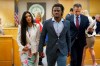 Philadelphia Phillies baseball player Odubel Herrera leaves a courtroom with an unidentified friend after a hearing on a domestic violence case in Atlantic City, N.J., Wednesday, July 3, 2019. (Jessica Griffin/The Philadelphia Inquirer via AP, Pool)