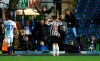 Newcastle United's Joselu celebrates scoring his side's third goal of the game during the Emirates FA Cup third round replay soccer match against Blackburn at Ewood Park, Blackburn, Tuesday Jan. 15, 2019. (Martin Rickett/PA via AP)