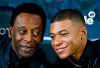 Brazilian soccer legend Pele, left, and French soccer player Kylian Mbappe pose during a photocall in Paris, Tuesday, April 2, 2019. (AP Photo)
