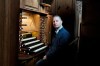 Johann Vexo, the organist who was playing at evening mass inside Notre Dame when flames began licking at the iconic cathedral's roof, poses at the pipe organ at Notre Dame de Nancy cathedral, eastern France, Wednesday, April 17, 2019. Vexo , who was playing at evening mass inside Notre Dame when flames began licking at the iconic cathedral's roof says people didn't immediately react when the fire alarm rang as a priest was reading from the Bible. (AP Photo/Oleg Cetinic)