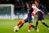 FILE - In this Sept. 26, 20-19 file picture PSG's Neymar, left, fights for the ball with Reims' Remi Oudin during the French League One soccer match between Paris-Saint-Germain and Reims at the Parc des Princes stadium in Paris, France. Fifth-placed Reims's excellent run in the French league is largely due to the performances of 22-year-old Remi Oudin, a versatile attacking midfielder with an impressive left foot and a great touch. (AP Photo/Michel Euler, File)