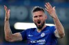 Chelsea's Oliver Giroud encourages the crowd during the Europa League semifinal second leg soccer match between FC Chelsea and Eintracht Frankfurt at Stamford Bridge stadium in London, Thursday, May 9, 2019. (AP Photo/Alastair Grant)
