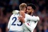 Tottenham's Danny Rose, right, hugs Tottenham's Christian Eriksen after the English Premier League soccer match between Tottenham Hotspur and Brighton & Hove Albion at Tottenham Hotspur stadium in London, Tuesday, April 23, 2019.(AP Photo/Frank Augstein)