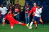 In his debut match for England, Callum Hudson-Odoi, right, vies for the ball with Montenegro's Marko Jankovic, left, during the Euro 2020 group A qualifying soccer match between Montenegro and England at the City Stadium in Podgorica, Montenegro, Monday, March 25, 2019. (AP Photo/Darko Vojinovic)