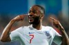 England's Raheem Sterling celebrates scoring his side's fifth goal during the Euro 2020 group A qualifying soccer match between Montenegro and England at the City Stadium in Podgorica, Montenegro, Monday, March 25, 2019. (AP Photo/Darko Vojinovic)