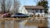 WAYNE.GLOWACKI@FREEPRESS.MB.CA
Water surrounds a home on the Peguis First Nation from the swollen Fisher River. The residents of the home have left and the pets are being cared for by volunteers.