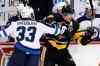 Gene J. Puskar / The Associated Press
Winnipeg Jets' Dustin Byfuglien (33) collides with Pittsburgh Penguins' Evgeni Malkin (71) during the first period of an NHL hockey game in Pittsburgh, Saturday.