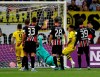 Dortmund's Jadon Sancho, second right, scores his side's second goal during the Bundesliga soccer match between Eintracht Frankfurt and Borussia Dortmund in the Commerzbank Arena in Frankfurt, Germany, Sunday, Sept.22, 2019. (AP Photo/Michael Probst)