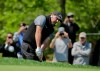 Phil Mickelson chips a shot onto the 13th green during a practice round for the PGA Championship golf tournament, Wednesday, May 15, 2019, at Bethpage Black in Farmingdale, N.Y. (AP Photo/Seth Wenig)