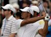 Tiger Woods drives on the sixth hole during a practice round for the PGA Championship golf tournament Tuesday, Aug. 9, 2011, at the Atlanta Athletic Club in Johns Creek, Ga. (AP Photo/Charlie Riedel)