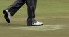 J.J. Henry walks across a patch on the 17th green during the first round of the PGA Championship golf tournament Thursday, Aug. 11, 2011, at the Atlanta Athletic Club in Johns Creek, Ga. (AP Photo/Charlie Riedel)