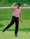 Rich Beem reacts after sinking a putt for birdie on the 18th green during the second round of the PGA Championship golf tournament, Friday, May 17, 2019, at Bethpage Black in Farmingdale, N.Y. (AP Photo/Andres Kudacki)