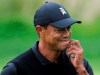 Tiger Woods reacts as he walks off the 7th green during the second round of the PGA Championship golf tournament, Friday, May 17, 2019, at Bethpage Black in Farmingdale, N.Y. (AP Photo/Julio Cortez)