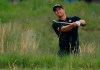 Adam Scott, of Australia, hits out of the rough on the 18th hole during the second round of the PGA Championship golf tournament, Friday, May 17, 2019, at Bethpage Black in Farmingdale, N.Y. (AP Photo/Andres Kudacki)