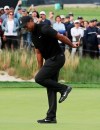Tiger Woods reacts after missing a putt for birdie on the 17th green during the second round of the PGA Championship golf tournament, Friday, May 17, 2019, at Bethpage Black in Farmingdale, N.Y. (AP Photo/Charles Krupa)