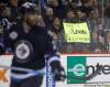 Trevor Hagan / Winnipeg Free Press
Fans hold signs Thursday giving their opinion on the franchise that used to belong in Winnipeg as the Winnipeg Jets host the Phoenix Coyotes at MTS Centre for the only time this season.