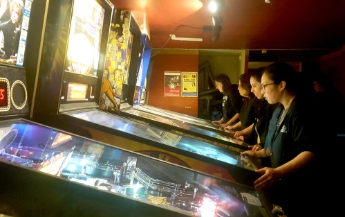 Bloomberg Echa Schneider
Photo by Echa Schneider
Members of Belles & Chimes, a women-only pinball league, play in Oakland, Calif.