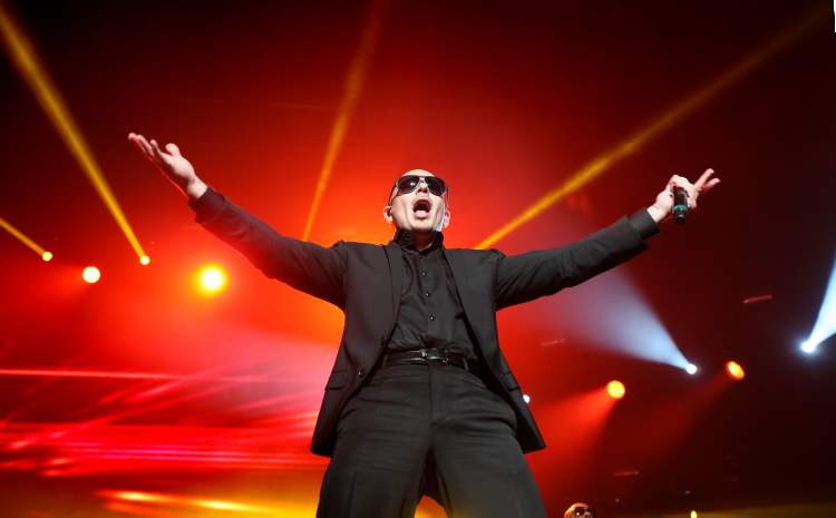 Ruth Bonneville / Winnipeg Free Press
Pitbull performs for 9,000 fans at the MTS Centre Saturday night. The Miami artist features a mix of hip-hop, electro-pop and Cuban-flavoured dance music with plenty of samples by other artists thrown in for good measure.