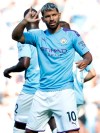 Manchester City's Sergio Aguero celebrates after scoring his sides second goal during the English Premier League soccer match between Manchester City and Watford at Etihad stadium in Manchester, England, Saturday, Sept. 21, 2019. (AP Photo/Rui Vieira)