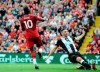 Liverpool's Sadio Mane, left, after scoring his sides second goal during the English Premier League soccer match between Liverpool and Newcastle at Anfield stadium in Liverpool, England, Saturday, Sept. 14, 2019. (AP Photo/Rui Vieira)