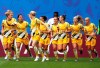Australia's Sam Kerr, 2nd left, celebrates with teammates after scoring her sides first goal during the Women's World Cup Group C soccer match between Australia and Italy at the Stade du Hainaut in Valenciennes, Sunday, June 9, 2019. (AP Photo/Francisco Seco)