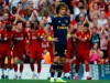 Arsenal's David Luiz stands on the pitch after Liverpool's Mohamed Salah scored his sides second goal during the English Premier League soccer match between Liverpool and Arsenal at Anfield stadium in Liverpool, England, Saturday, Aug. 24, 2019. (AP Photo/Rui Vieira)