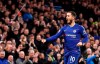 Chelsea's Eden Hazard celebrates after scoring his sides second goal during the English Premier League soccer match between Chelsea and Brighton & Hove Albion at Stamford Bridge stadium in London, Wednesday, April 3, 2019. (AP Photo/Frank Augstein)