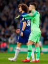 Chelsea's David Luiz, left, walks past Chelsea goalkeeper Kepa Arrizabalaga, right, during the English League Cup final soccer match between Chelsea and Manchester City at Wembley stadium in London, England, Sunday, Feb. 24, 2019. (AP Photo/Alastair Grant)