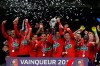 Players of Rennes celebrate with trophy after winning the French Cup soccer final between Rennes and Paris Saint Germain at the Stade de France stadium in Saint-Denis, outside Paris, France, Saturday, April 27, 2019. (AP Photo/Thibault Camus)