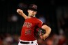 Arizona Diamondbacks starting pitcher Zac Gallen throws to a Philadelphia Phillies batter during the first inning of a baseball game Wednesday, Aug. 7, 2019, in Phoenix. (AP Photo/Ross D. Franklin)