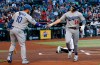 Los Angeles Dodgers' Enrique Hernandez (14) celebrates his home run against the Arizona Diamondbacks with Dodgers' Justin Turner (10) during the first inning of a baseball game, Tuesday, June 25, 2019, in Phoenix. (AP Photo/Ross D. Franklin)